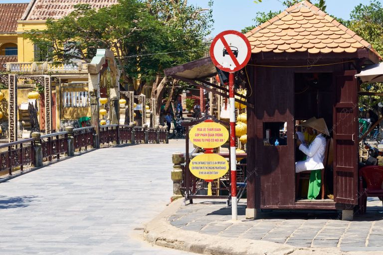Nguyen Phuc Chu view of the Bridge of Lights (Cau An Hoi) and ticket booth in Hoi An, Vietnam