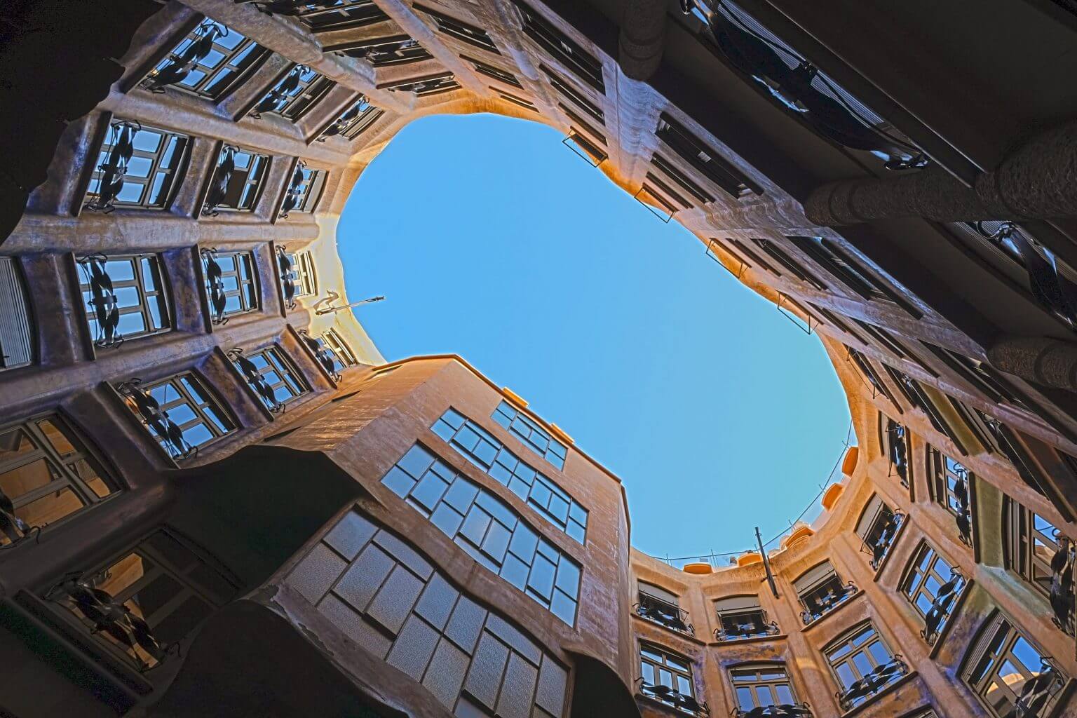 Antoni Gaudí's Casa Milà atrium in Barcelona, Spain