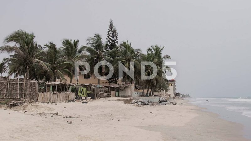View Of Beach Bar, Palm Trees And Waves At Kokrobite Beach, Ghana