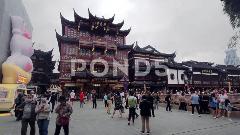 Yuyuan Garden Nine-Turn Bridge, Buildings And Crowds, Shanghai, China Yuyuan Garden Nine-Turn Bridge, Buildings And Crowds, Shanghai, China