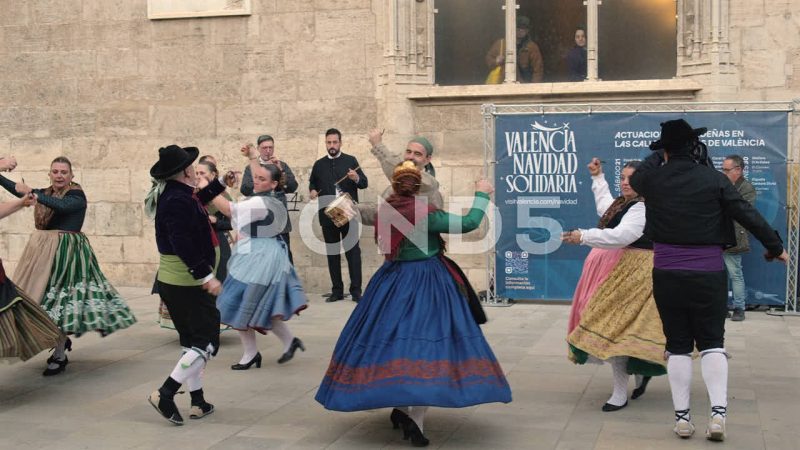 Men And Women Traditional Spanish Dancing In Street, Valencia, Spain