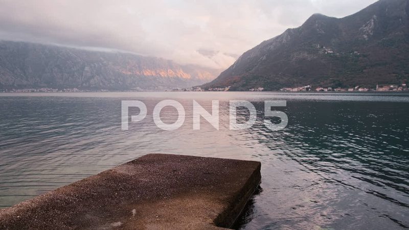 Empty Stone Pier At Perast Beach Facing Kotor Bay, Perast, Montenegro