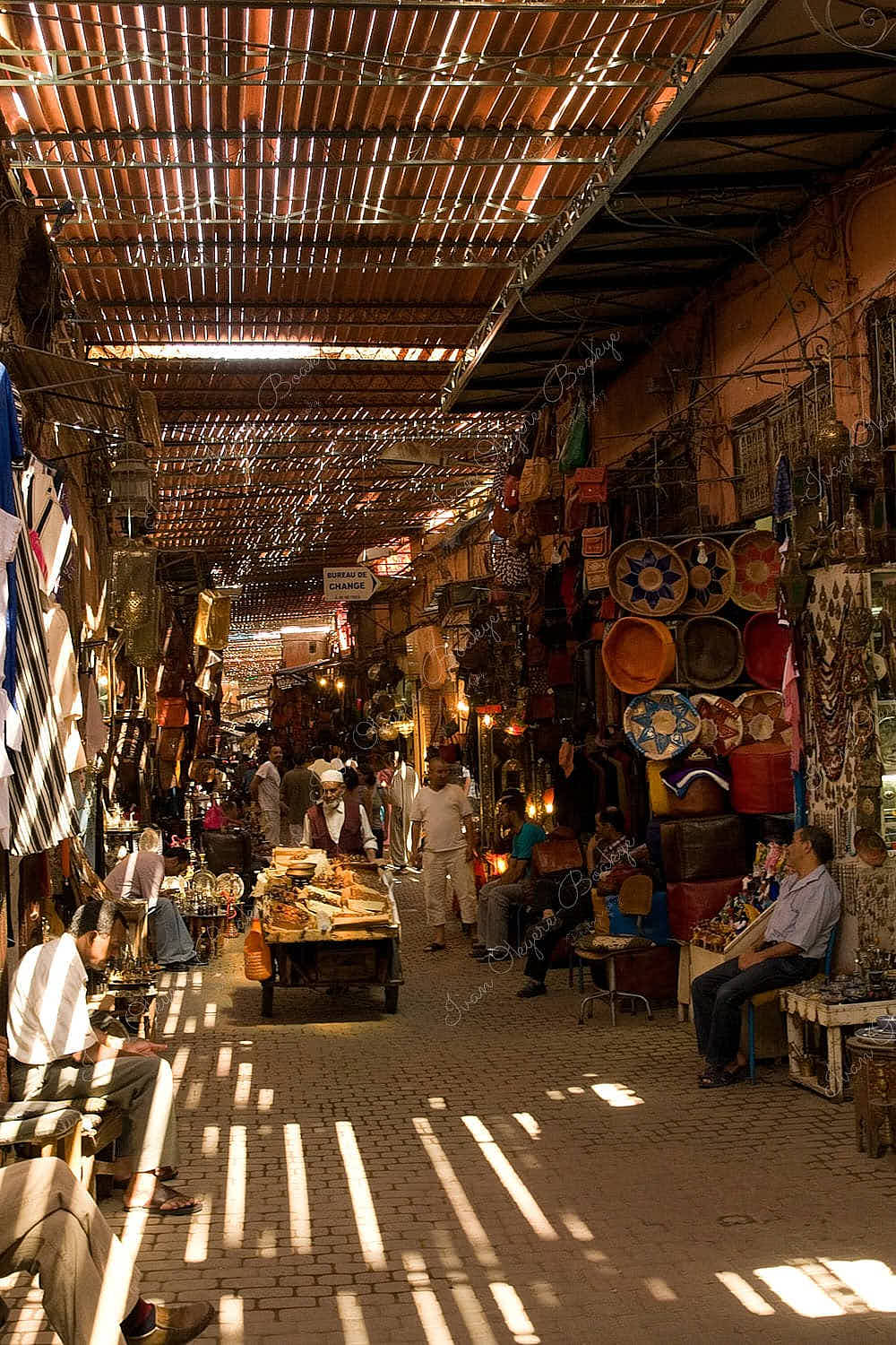 Traders and customers in a souq in a medina in Marrakesh, Morocco