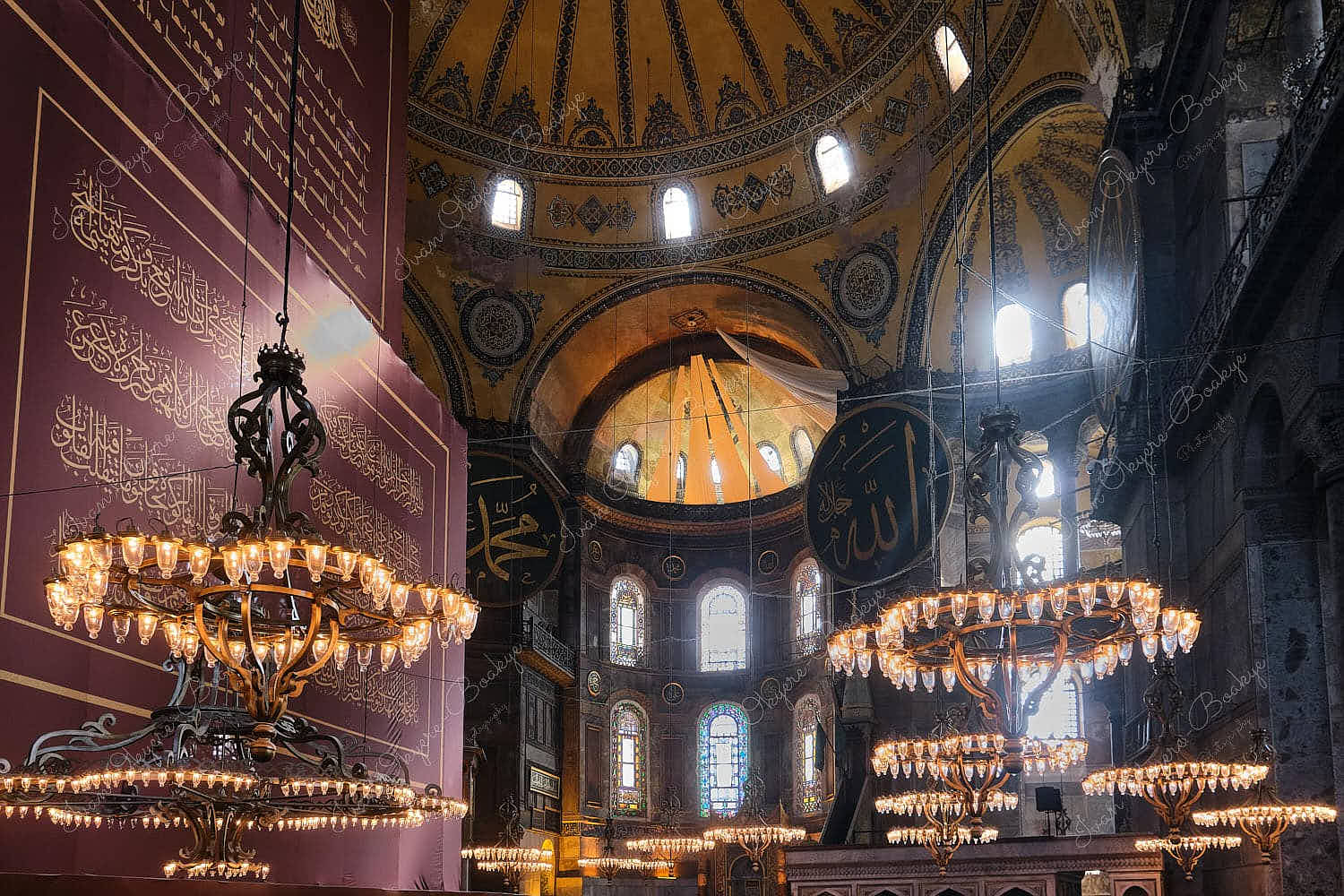 Hanging chandelier lights in the main prayer room in Hagia Sophia Mosque, Istanbul, Turkey