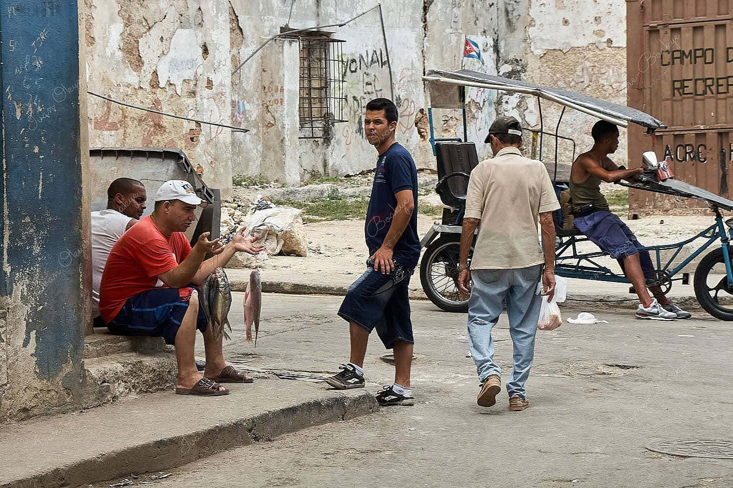 Cuban man selling fish on the street inHabana Vieja; Havana, Cuba