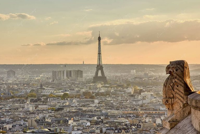 Panoramic view of Paris skyline and Eiffel Tower from Sacré-Cœur Basilica in Paris, France