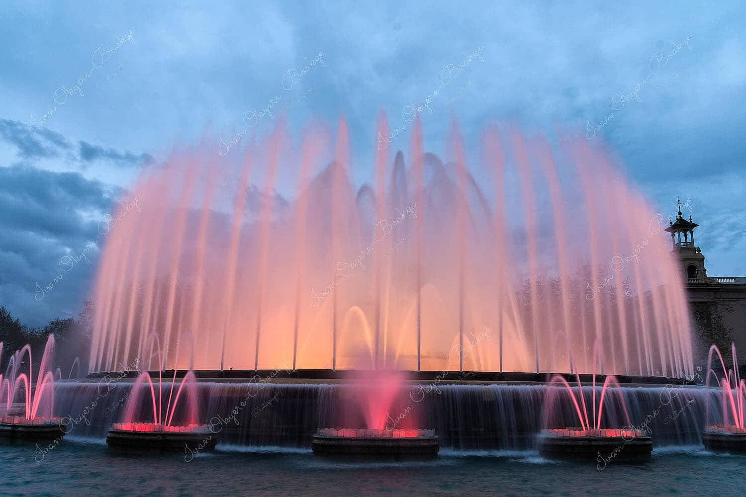 The Magic Fountain of Montjuïc illuminations at The Palau Nacional, Barcelona, Spain