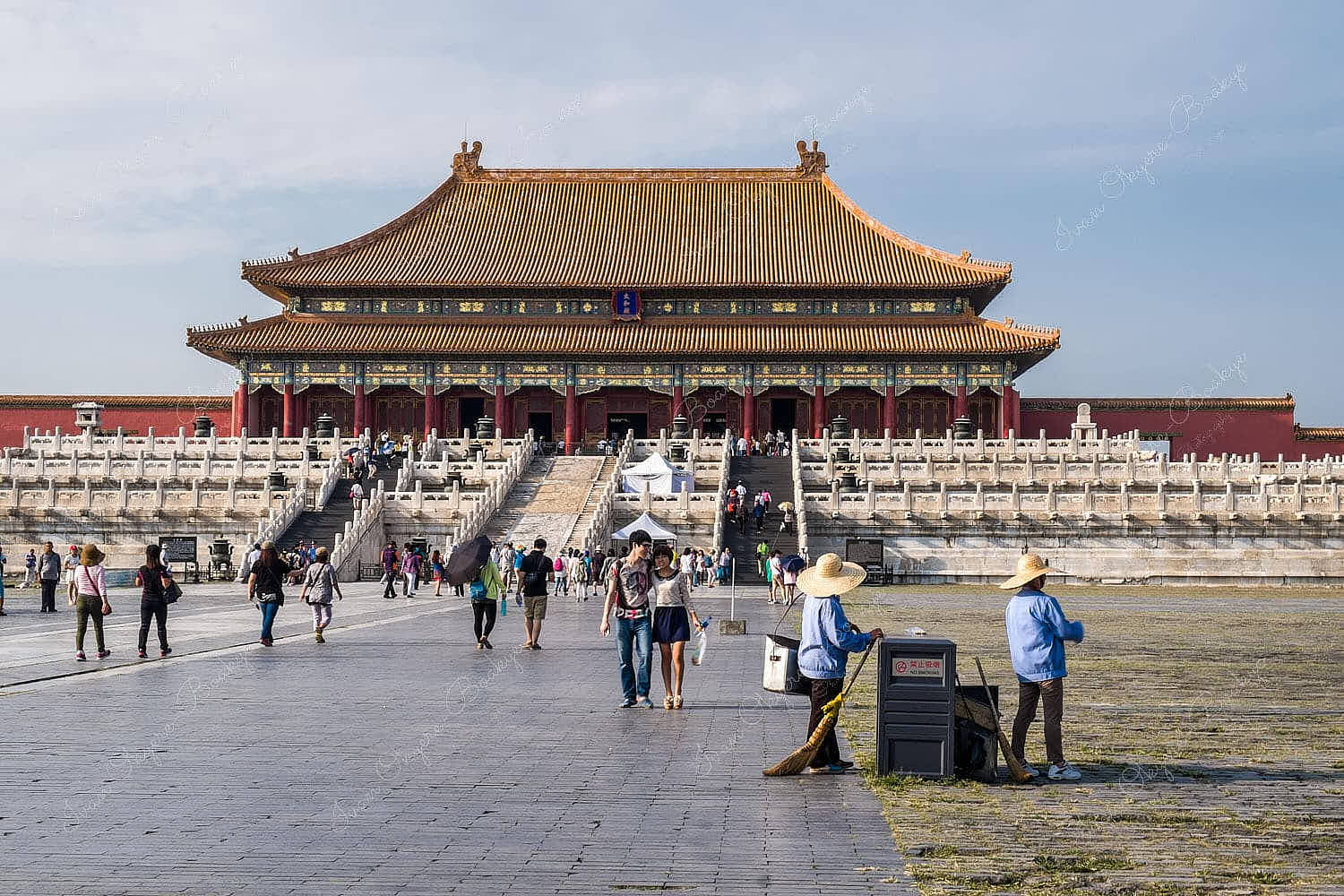 Tourists walking in front of the Hall of Supreme Harmony in Forbidden City, Beijing, China