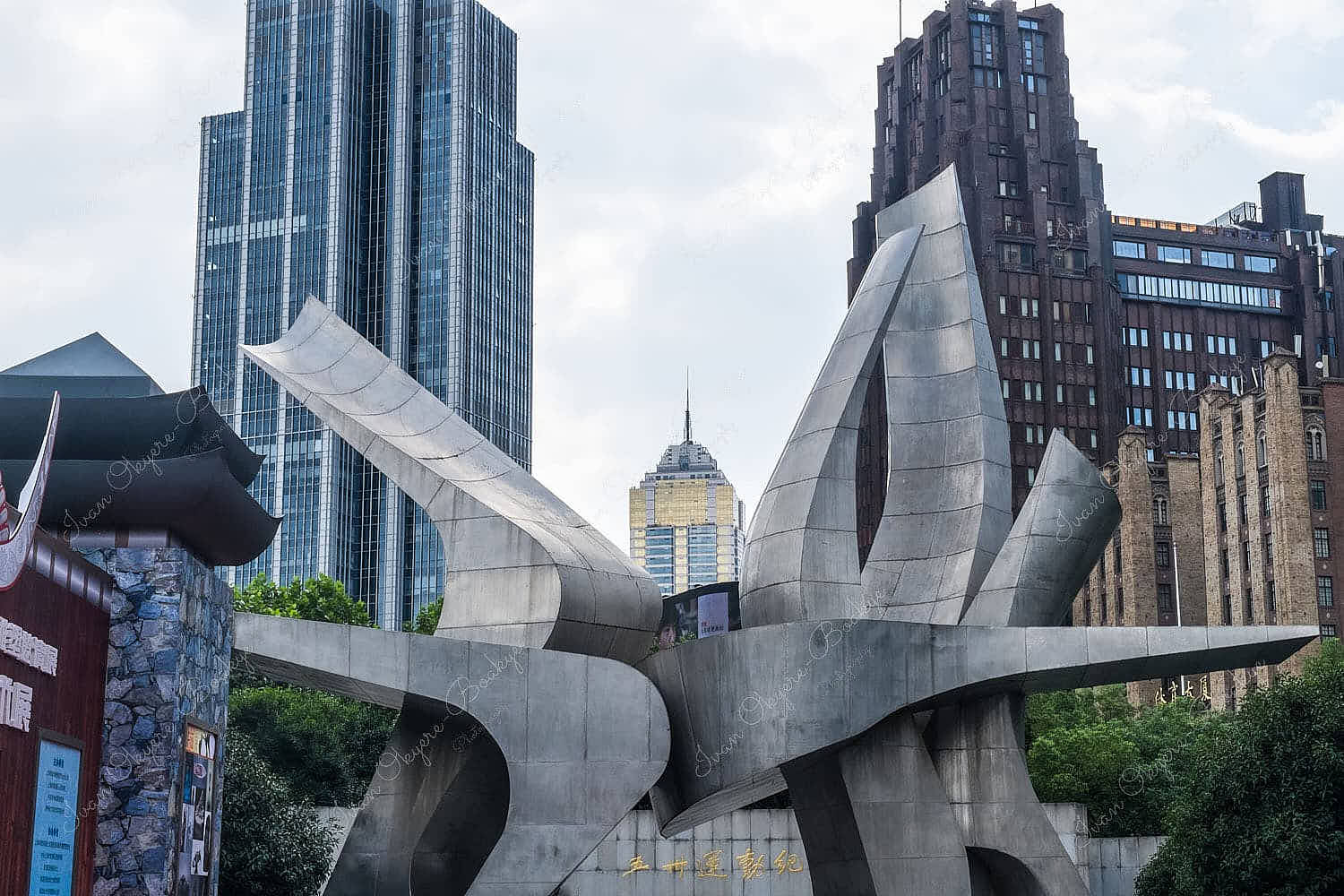 Jin Mao Tower seen through a sculpture in People’s Square, Shanghai, China