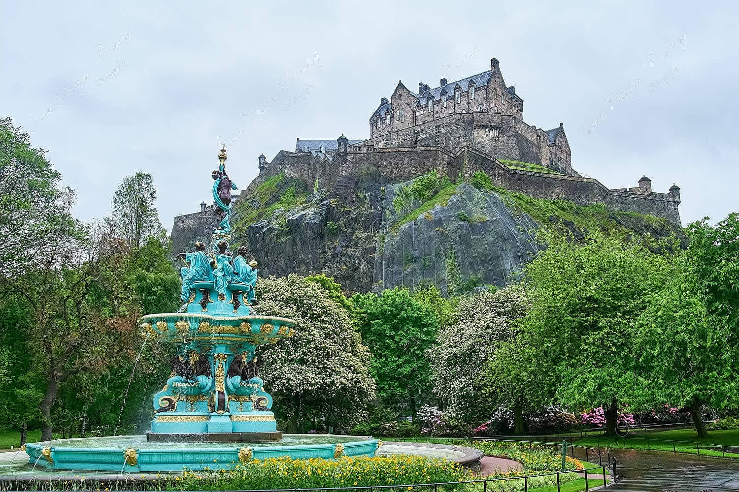 Ross Fountain with the Edinburgh Castle at the top of the hill in Edinburgh, Scotland, UK
